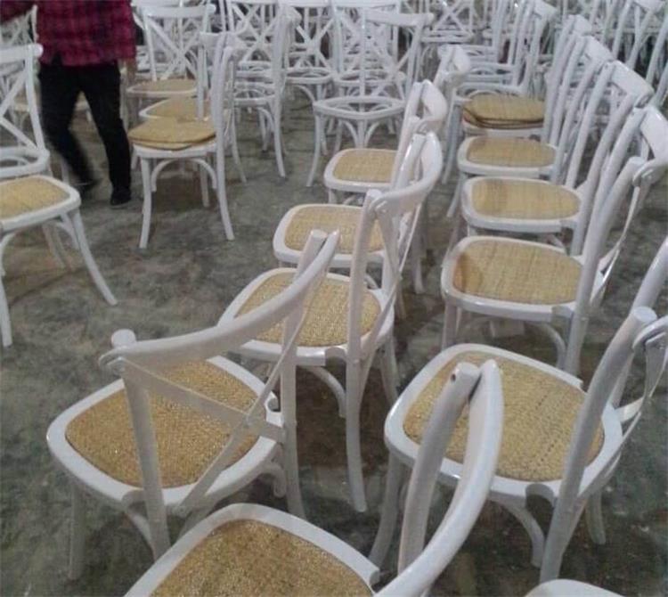 white cross back chairs with rattan seats